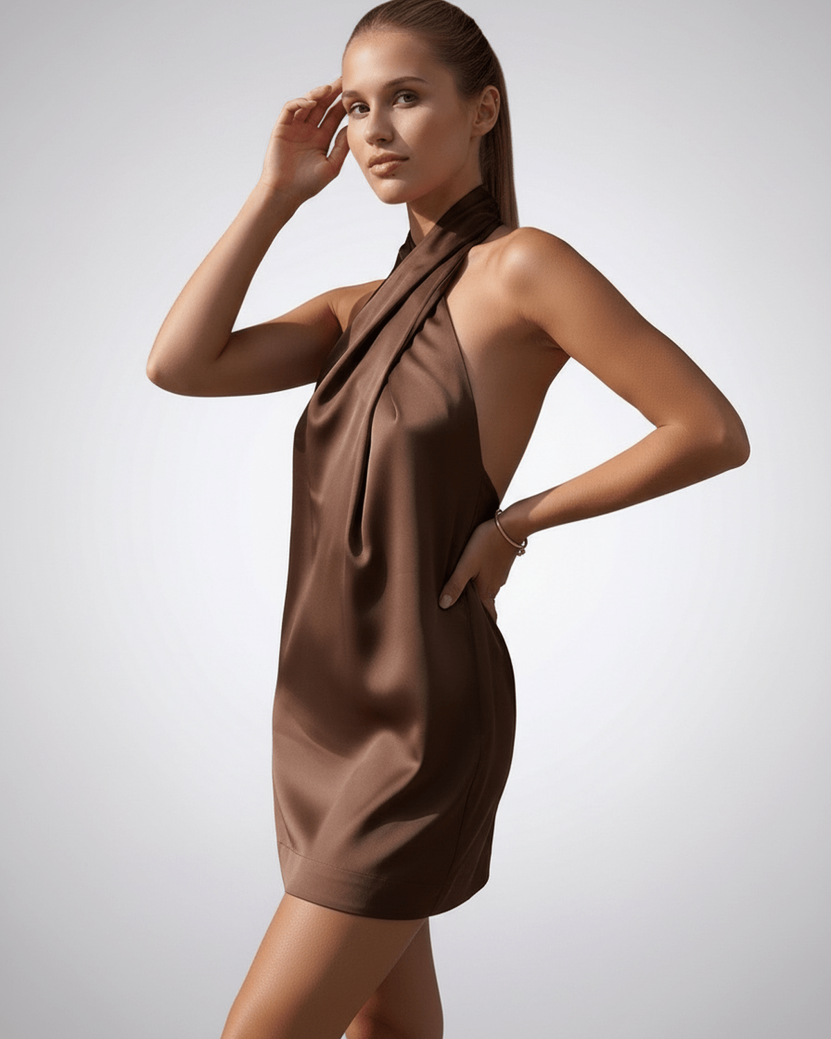 Saya Mini Dress by RAMBLION, luxurious brown satin halter design, perfect for sunny occasions, showcasing elegance and comfort.