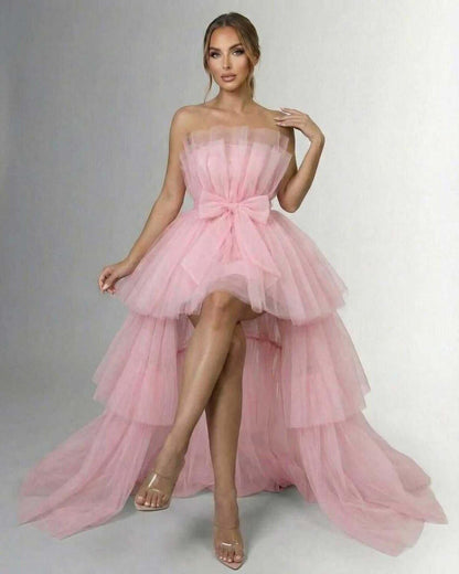 Seraphina Maxi Dress – strapless tulle gown with high-low hem and bow belt in soft pink, perfect for special occasions.