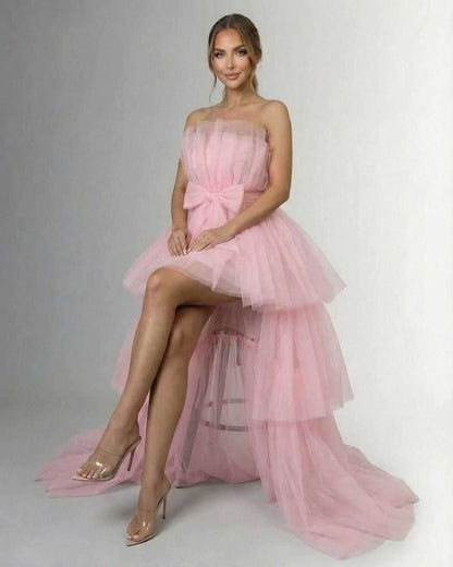 Seraphina Maxi Dress - Elegant strapless tulle high-low gown in soft pink with a bow accent by RAMBLION.