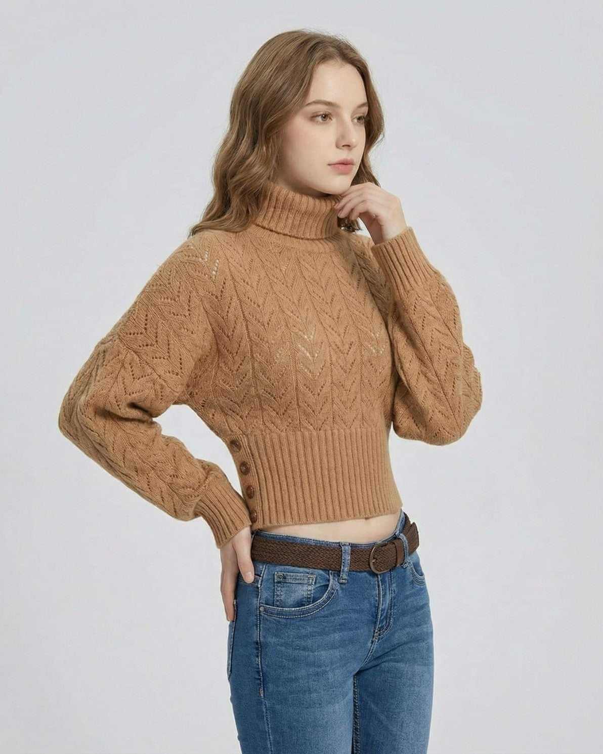 Model wearing Sienna Sweater by RAMBLION, a slim fit turtleneck knit sweater in a textured pattern.