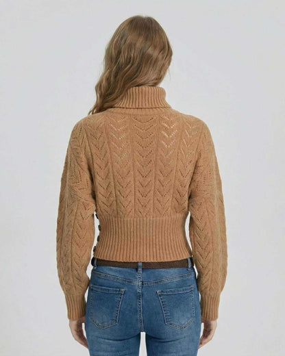Back view of the Sienna Sweater, a slim fit turtleneck knit sweater featuring a textured pattern in a chic, modern style.