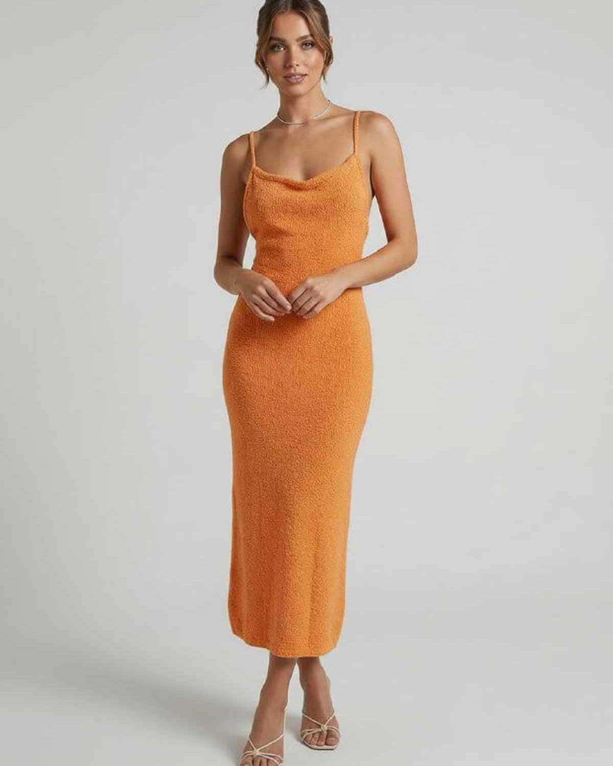 Sima Midi Dress in bold orange hue, 100% Cotton, round neck, perfect for warm weather outings by RAMBLION.