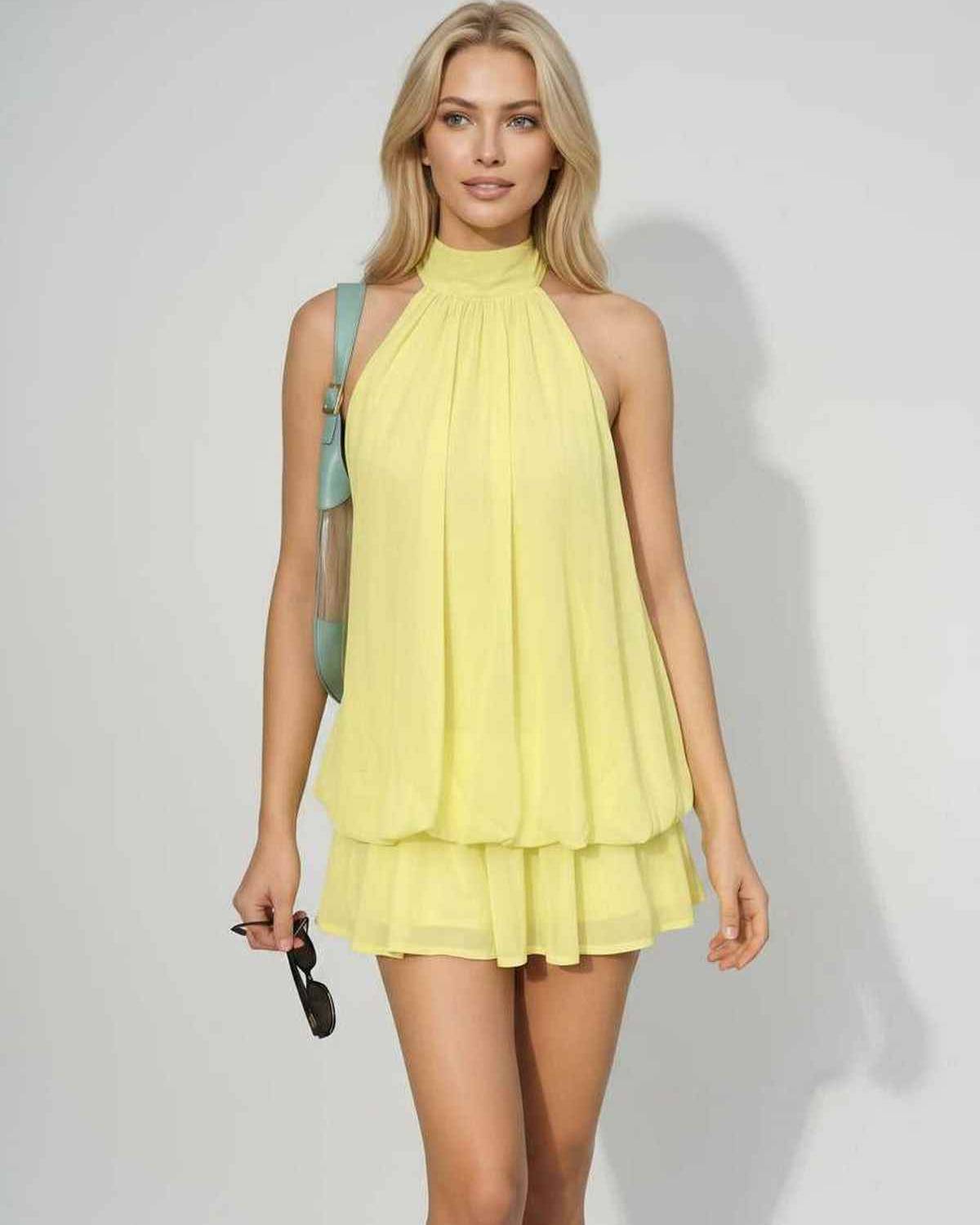 Ramblion Solina mini dress — tie-neck neckline · back view · styled for prom season