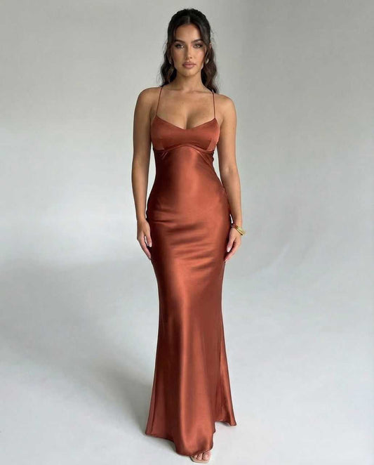 Tara Maxi Dress in rich brown satin, featuring a V-neckline and spaghetti straps, perfect for elegant occasions by RAMBLION.