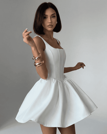 Tara Mini Dress by RAMBLION, white satin mini dress with square neck, corset bodice, and chic aesthetic, perfect for stylish occasions.