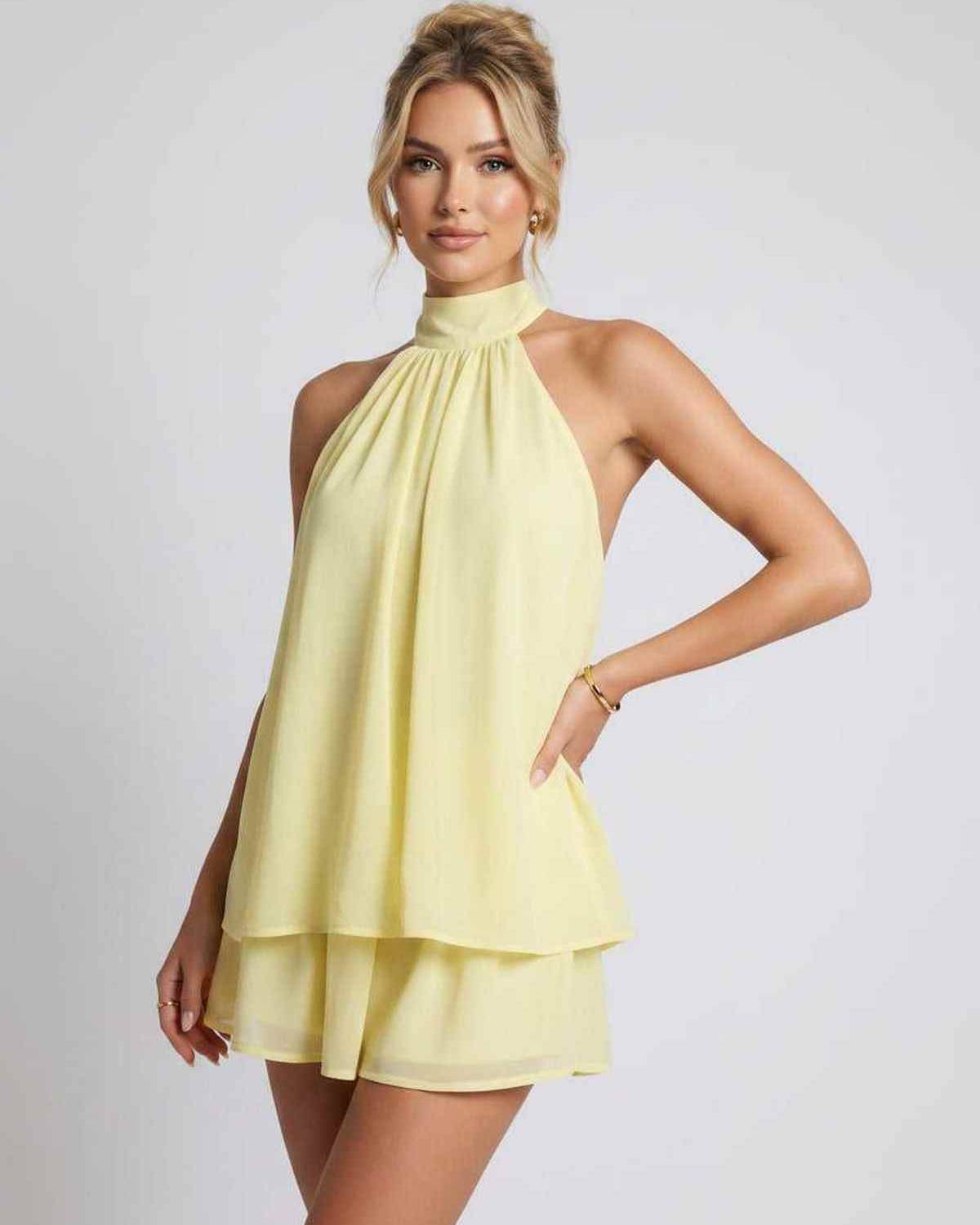 Ramblion Tessa mini dress — halter neckline · back view · styled for prom season