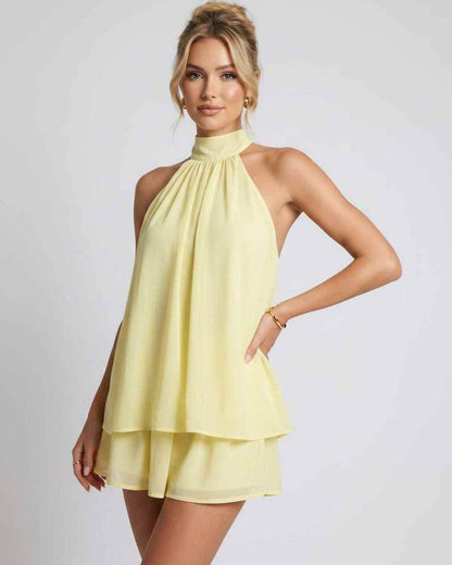 Ramblion Tessa mini dress — halter neckline · back view · styled for prom season
