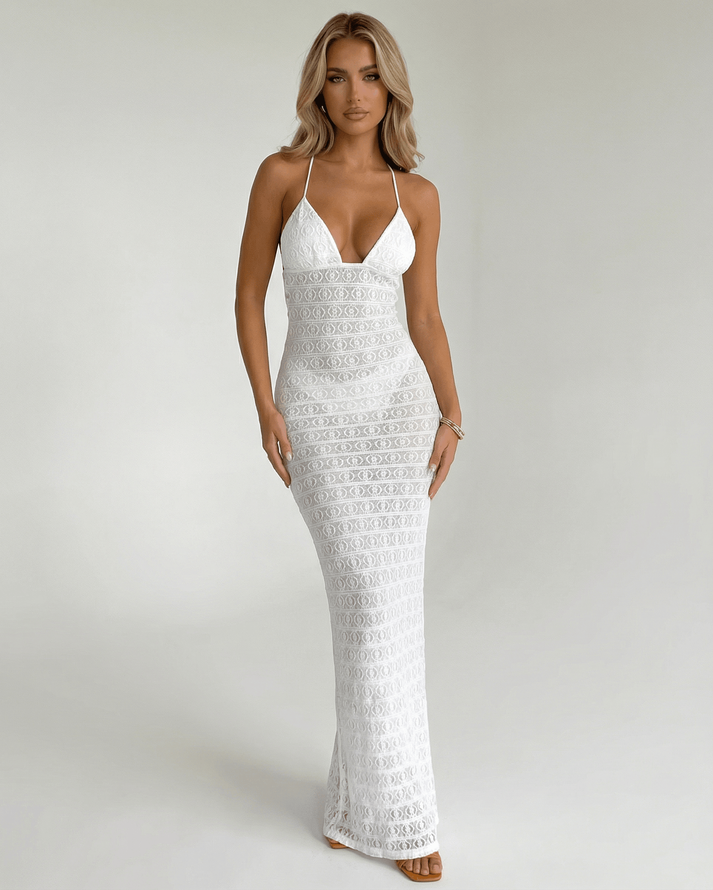 Teva Maxi Dress: Elegant white ankle-length dress with lace detailing, V neck, perfect for sophisticated occasions by RAMBLION.
