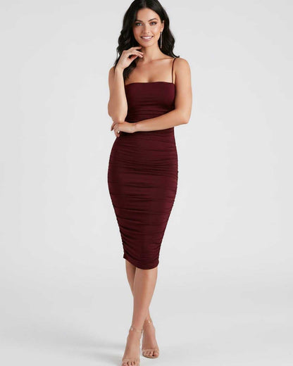 Ramblion Una midi dress — square neck neckline · side detail · styled for cocktail season