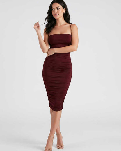 Ramblion Una midi dress — square neck neckline · fabric close-up · styled for cocktail season