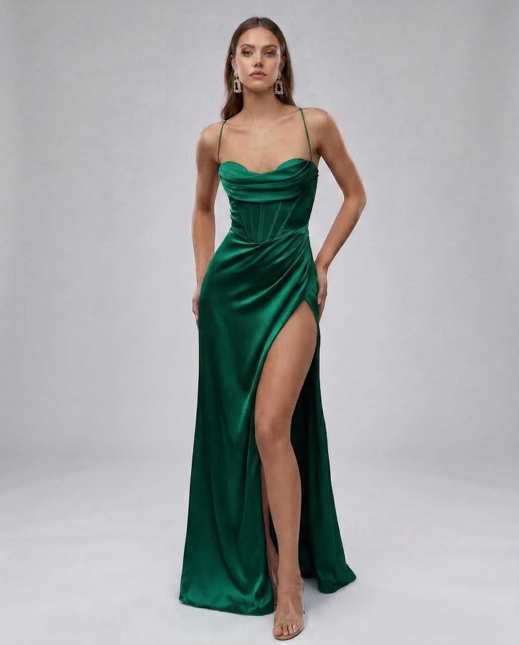 Ursa Maxi Dress in emerald green satin, featuring a sweetheart neckline and thigh-high slit – perfect for special occasions by RAMBLION.