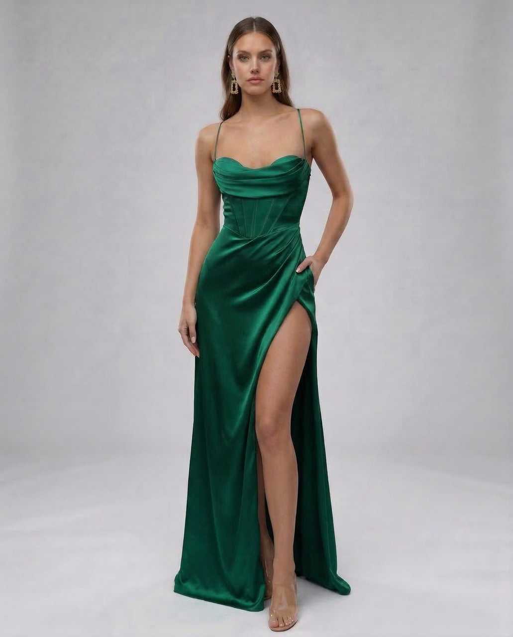 Ursa Maxi Dress by RAMBLION in emerald green satin, featuring a sweetheart neckline and elegant thigh-high slit.