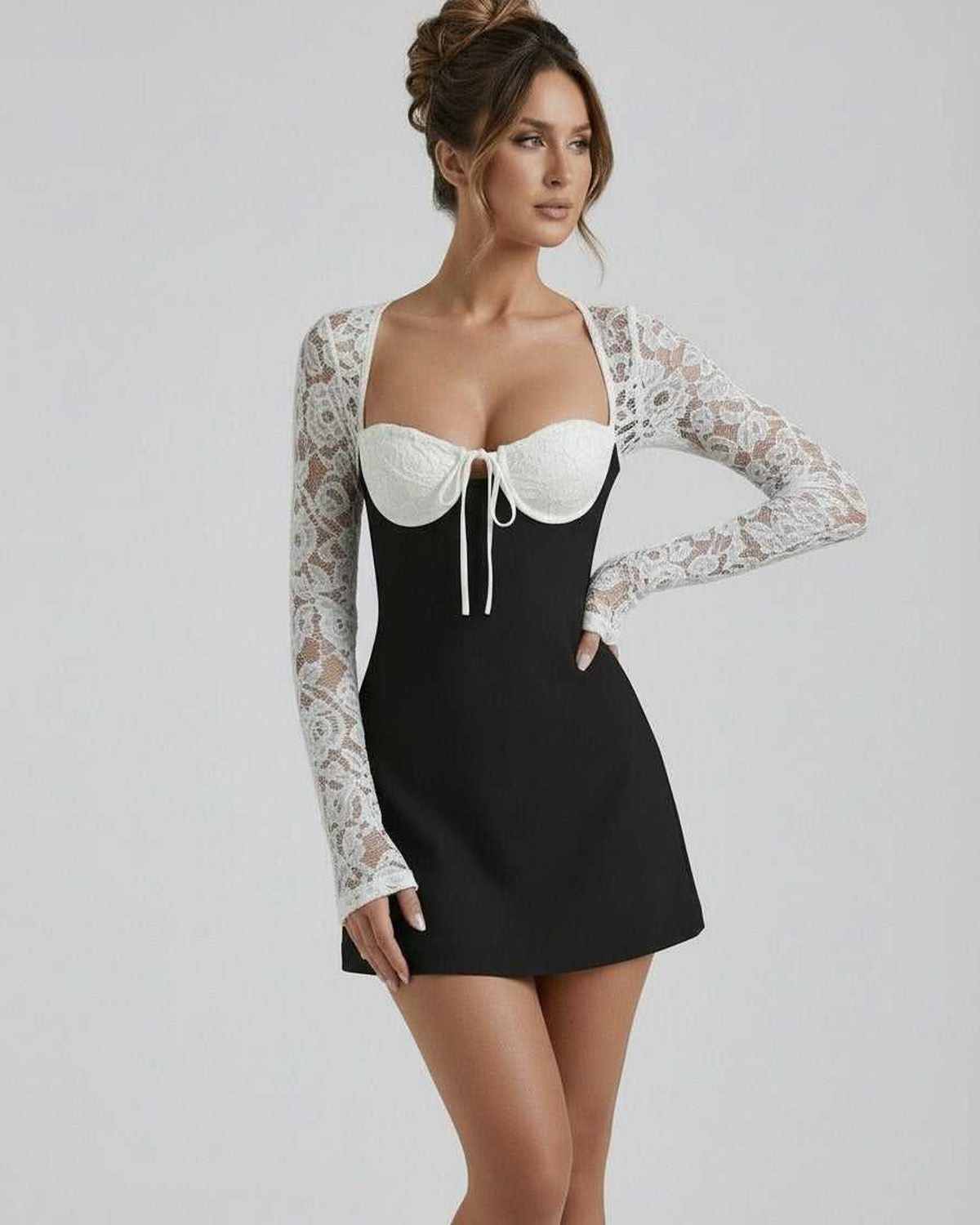 Vafy Mini Dress with black fabric and white lace, elegant style for chic occasions by RAMBLION.