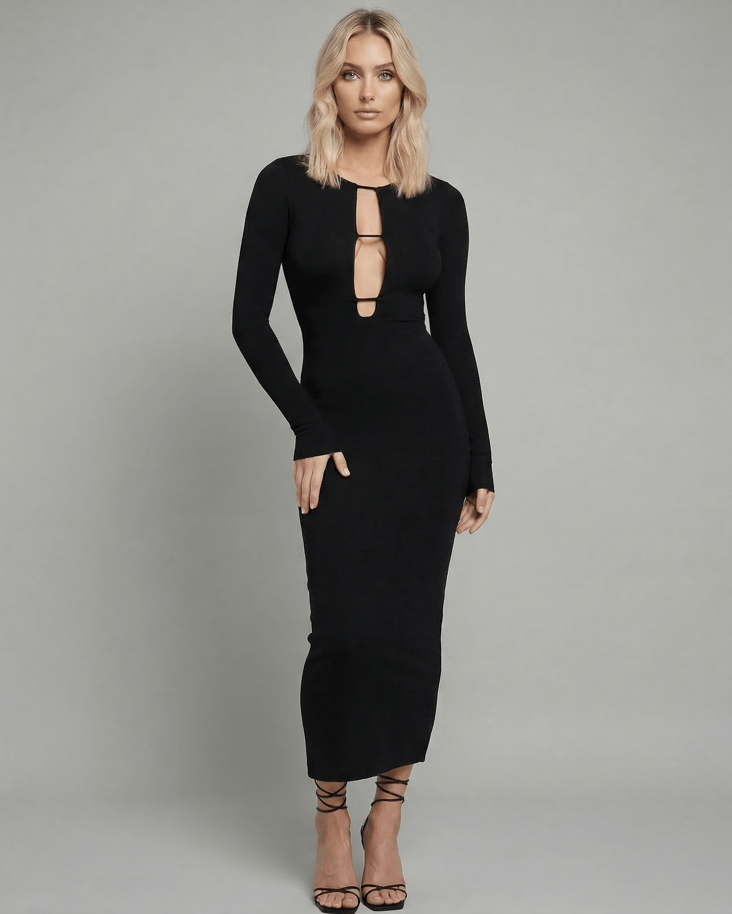 Veda Midi Dress by RAMBLION, black long sleeve, hollow out detail, stylish choice for special occasions.