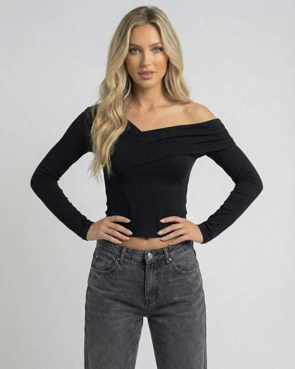 Vela Long Sleeve black off-the-shoulder top by RAMBLION, elegant slim fit, perfect for chic occasions.