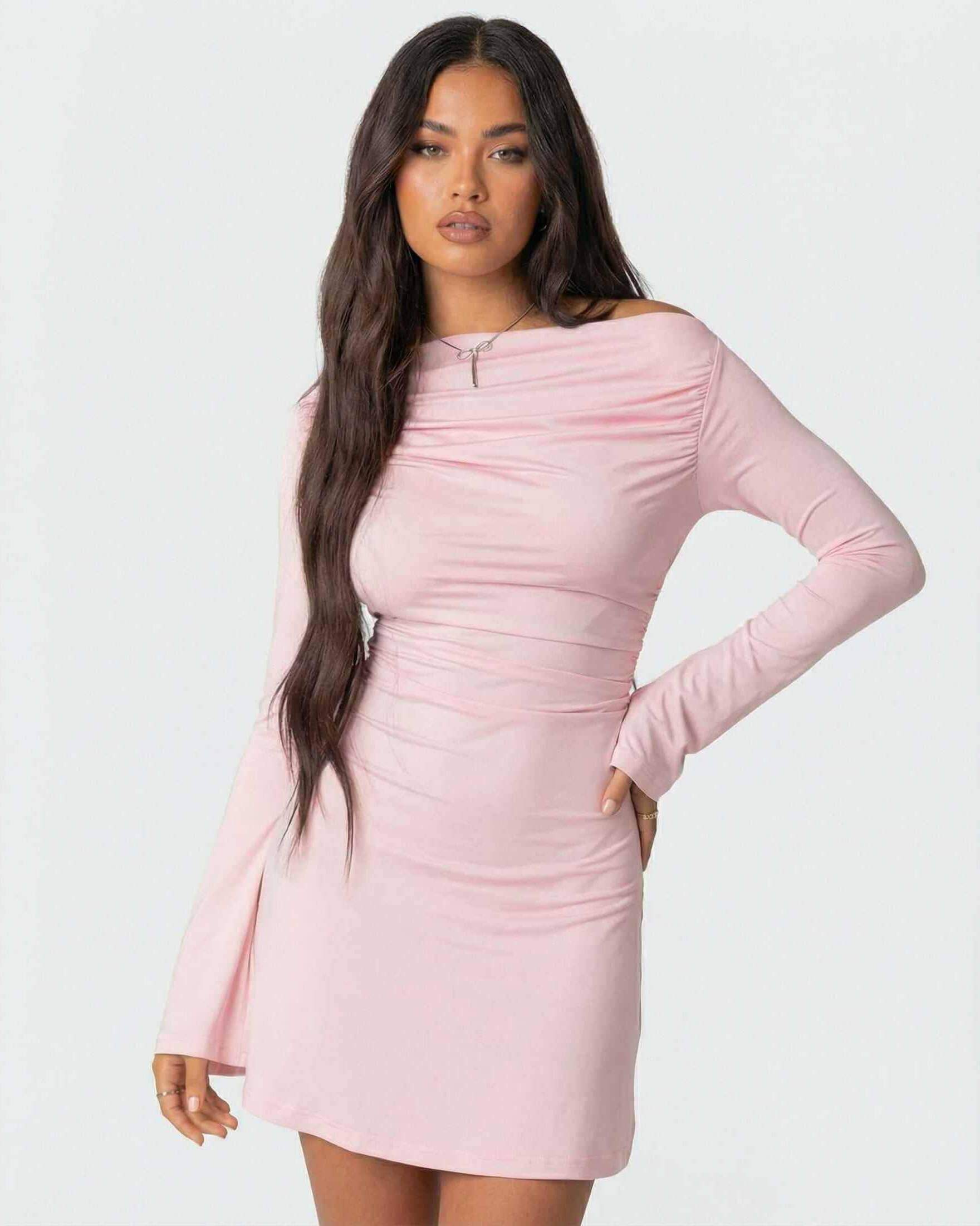 Vona Mini Dress featuring a soft pink color, asymmetrical neckline, perfect for a chic occasion, by RAMBLION.