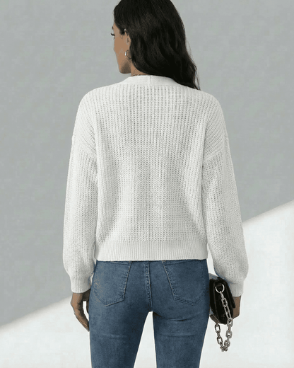 Back view of the Wema Cardigan, a lightweight knit women's cardigan by RAMBLION, showcasing breathable comfort and a stylish feel.