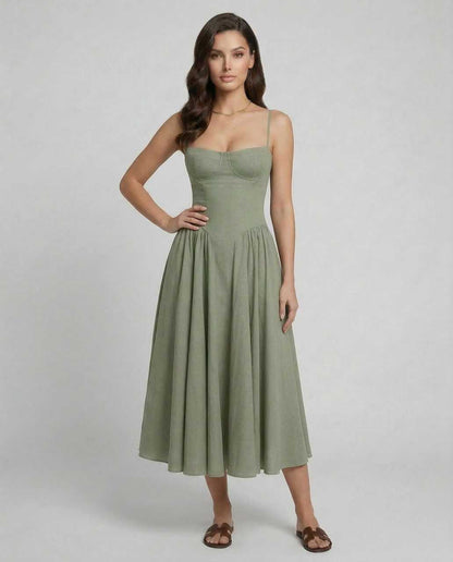 Wuma Midi Dress in green cotton blend, featuring chic slash neckline and spaghetti straps, perfect for elegant occasions by RAMBLION.