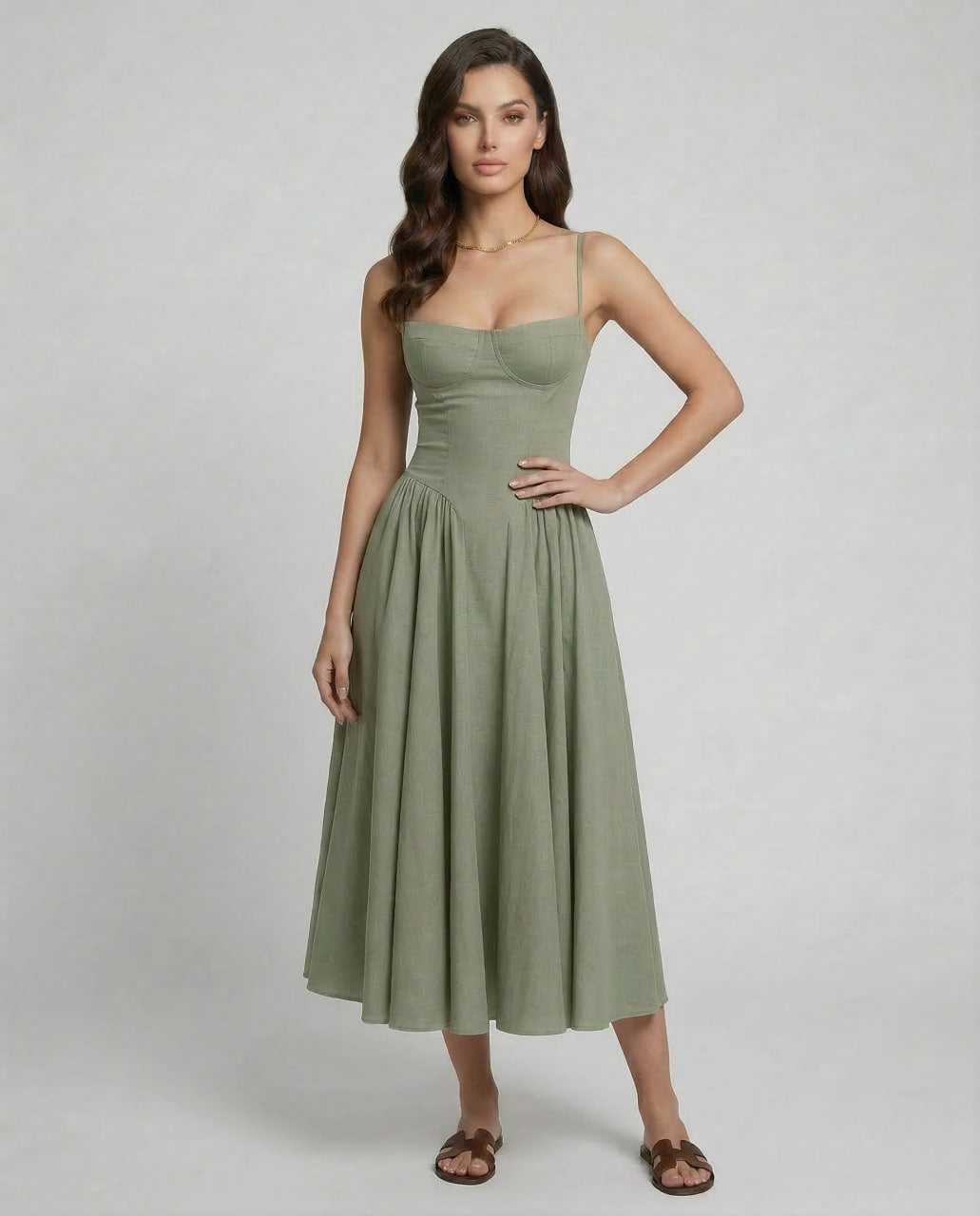Wuma Midi Dress in green featuring a chic slash neckline, perfect for elegant occasions by RAMBLION.