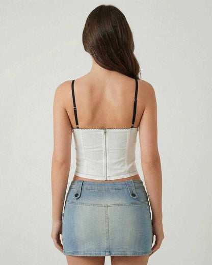 Back view of Xafa Top, a chic white camisole with thin straps and faux-fur detail, perfect for versatile styling.