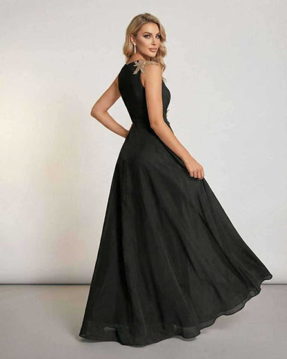 Xafo Maxi Dress, black satin ankle-length dress, flowing silhouette, formal evening wear, RAMBLION brand.