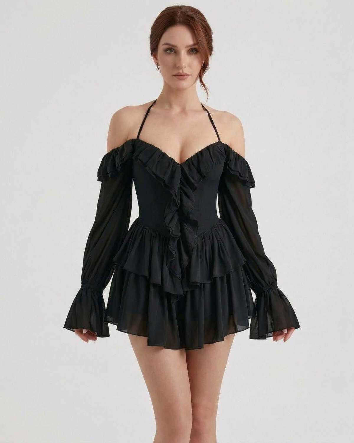 Xala Mini Dress by RAMBLION in black with halter neck and ruffled design, perfect for evening outings.