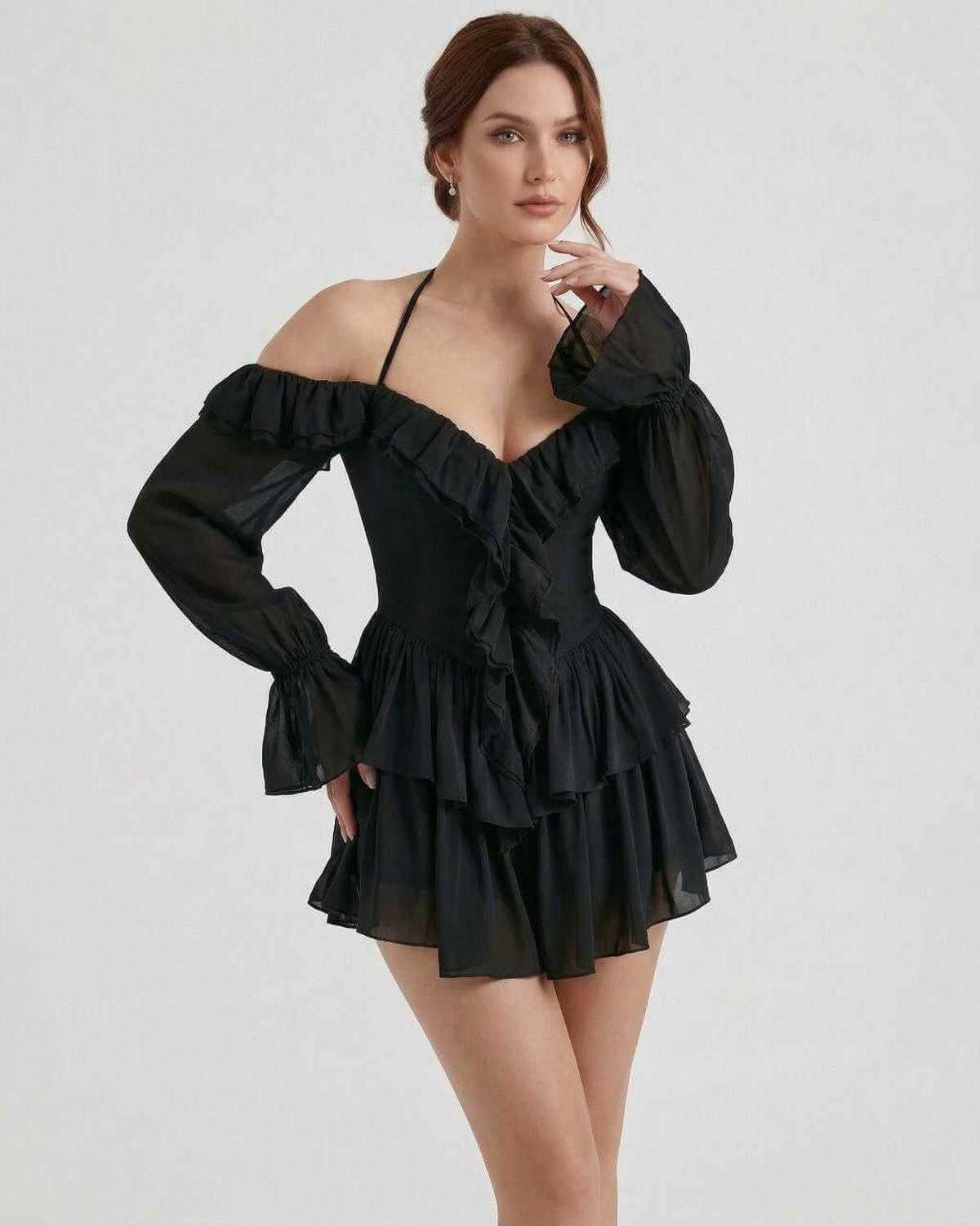 Xala Mini Dress in black satin with halter neckline, ruffled design, perfect for evening outings by RAMBLION.