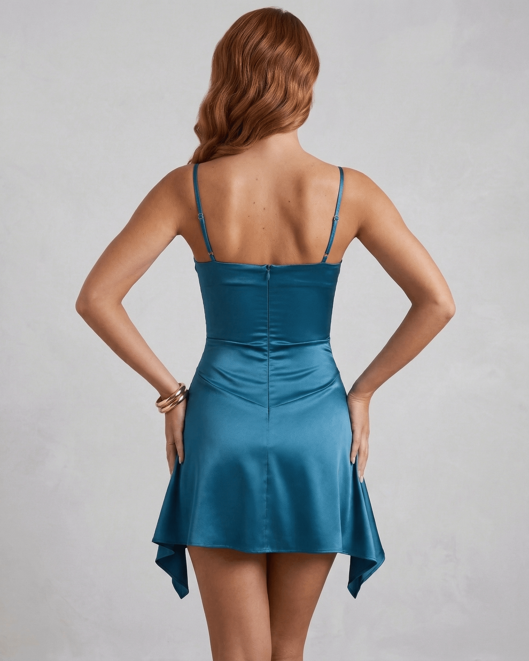 Xama Mini Dress back view in teal satin, featuring a square neck and flowy skirt, perfect for elegant occasions – RAMBLION.