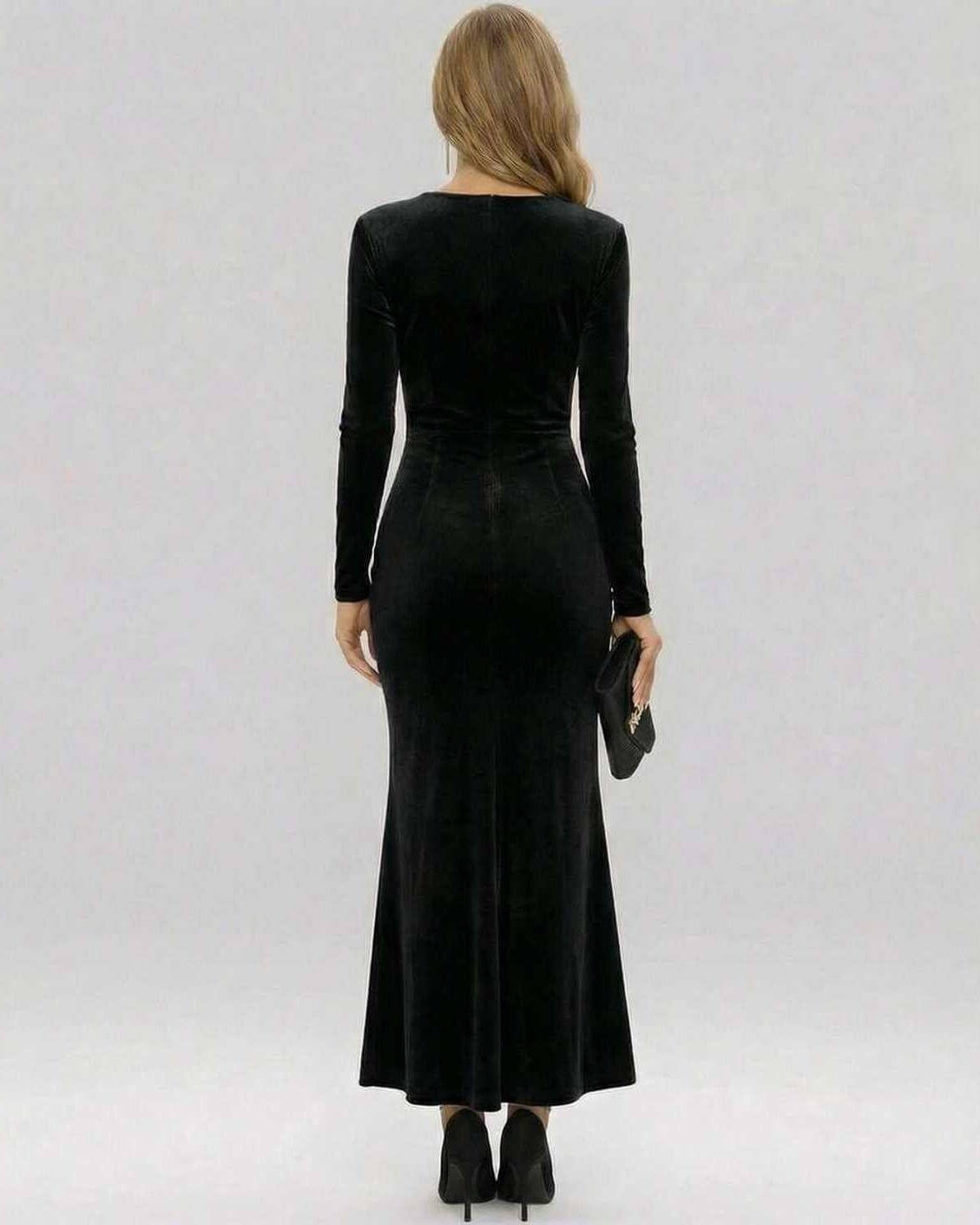 Back view of Xana Maxi Dress by RAMBLION, a black velvet ankle-length sheath dress with long sleeves.
