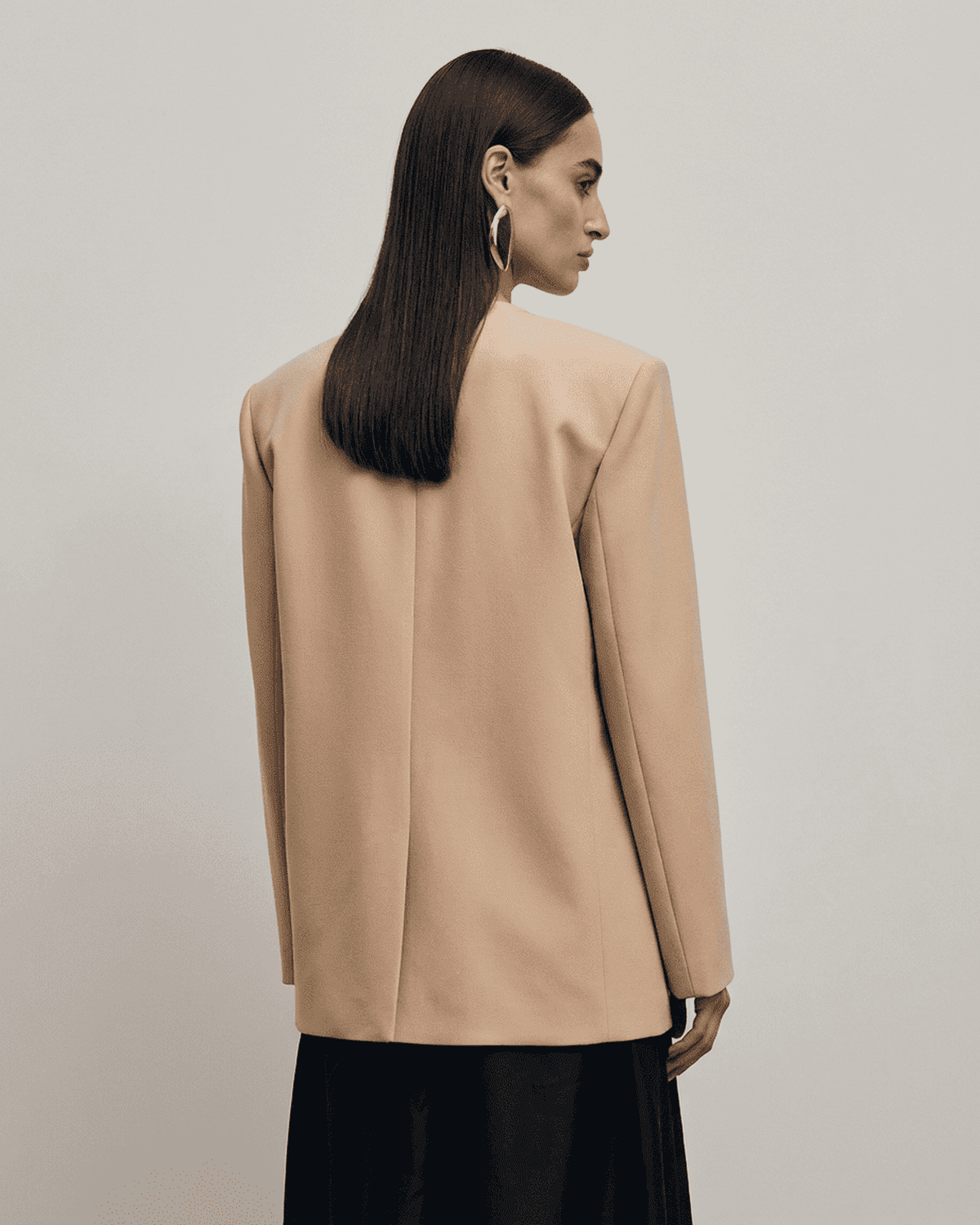 Xoa Blazer by RAMBLION in beige, tailored silhouette enhancing elegance for versatile day to night wear.
