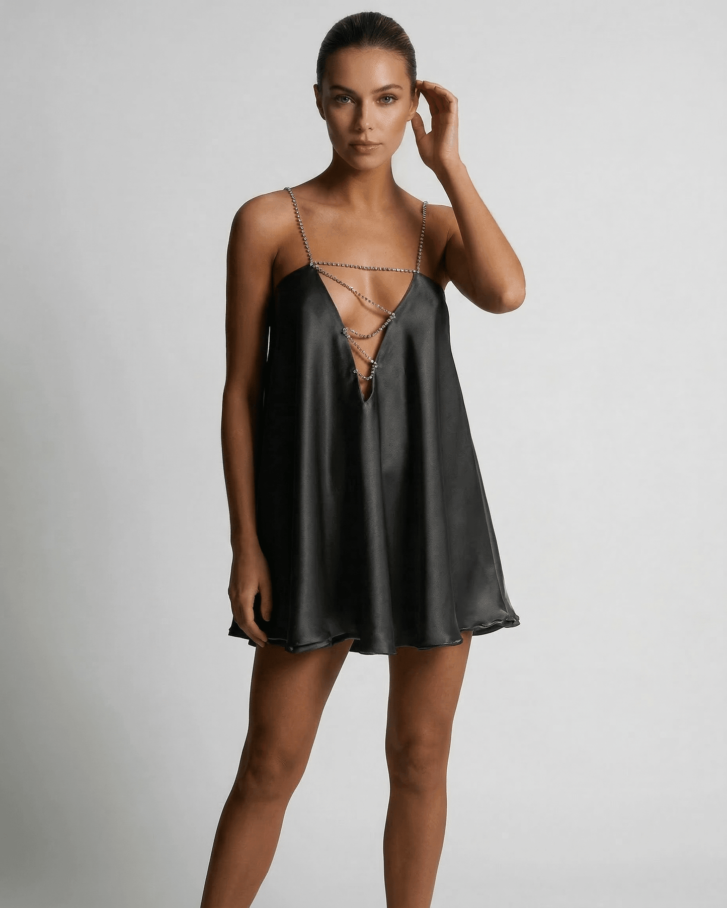 Yafe Mini Dress featuring a V-neckline, spaghetti straps, and a flowing silhouette for summer occasions by RAMBLION.