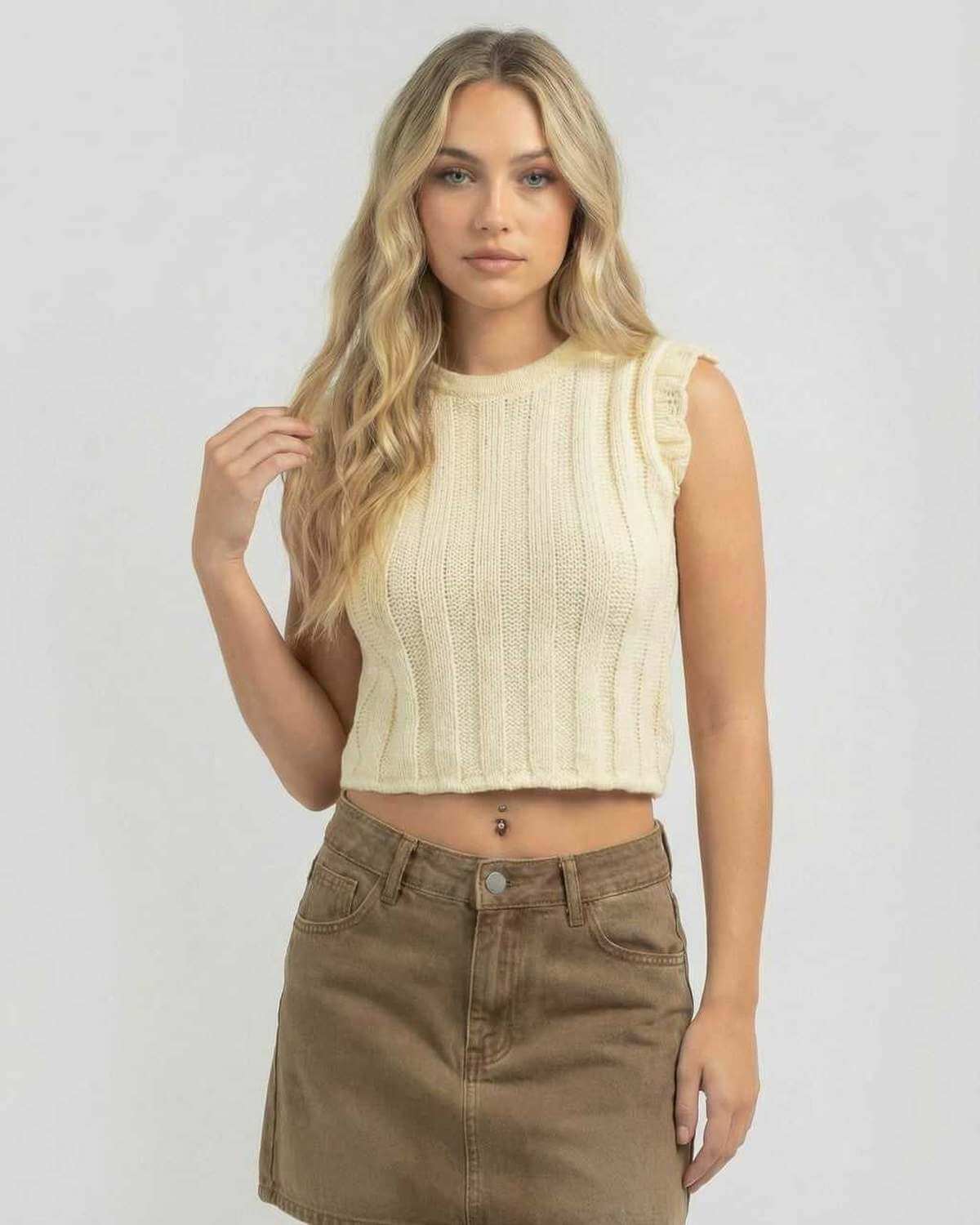 Yama Top in beige, 100% cotton, sleeveless, cropped knit style by RAMBLION, perfect for summer outfits.