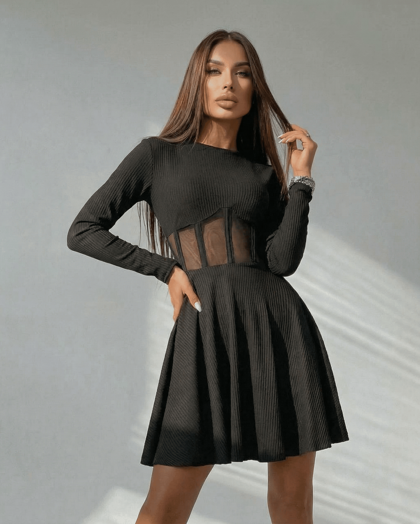 Yera Mini Dress in black with sheer corset panel, perfect for chic occasions, by RAMBLION.