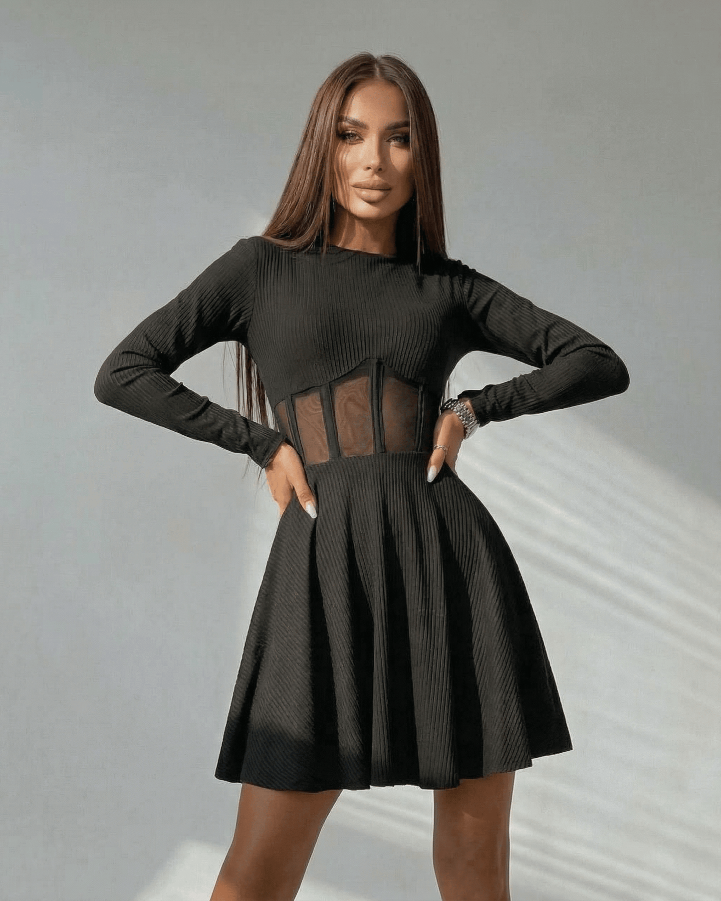 Yera Mini Dress featuring a sheer corset panel, A-line design, and elegant black color by RAMBLION.
