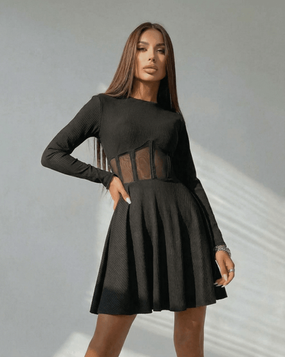 Yera Mini Dress featuring black A-line design, sheer corset panel, elegant style for casual occasions by RAMBLION