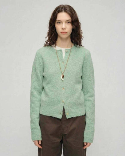Yola Cardigan from RAMBLION, rich green thick knit for warmth, versatile layering for polished style.