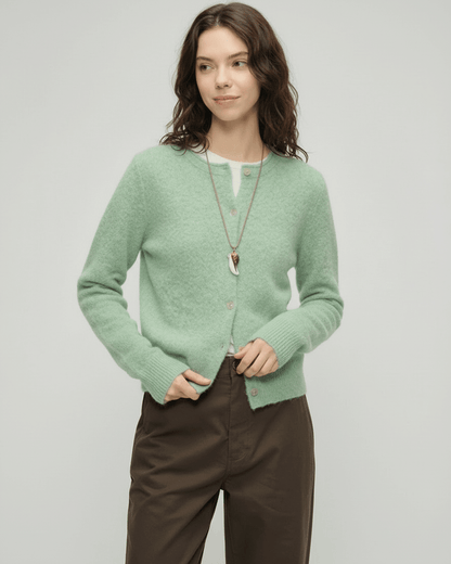 Yola Cardigan from RAMBLION in soft green hue, thick knit for warmth, perfect for layering, elevates everyday style.