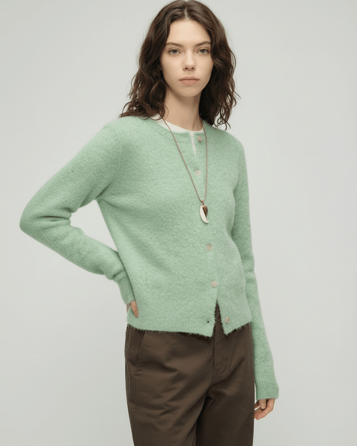 Yola Cardigan by RAMBLION, soft green knit, perfect for layering in cool weather, stylish and versatile layering piece.