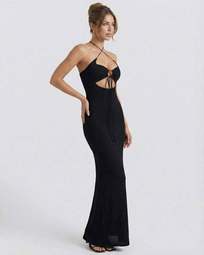 Zala Maxi Dress by RAMBLION, black ankle-length dress with halter neckline and cutouts, perfect for elegant evening wear.