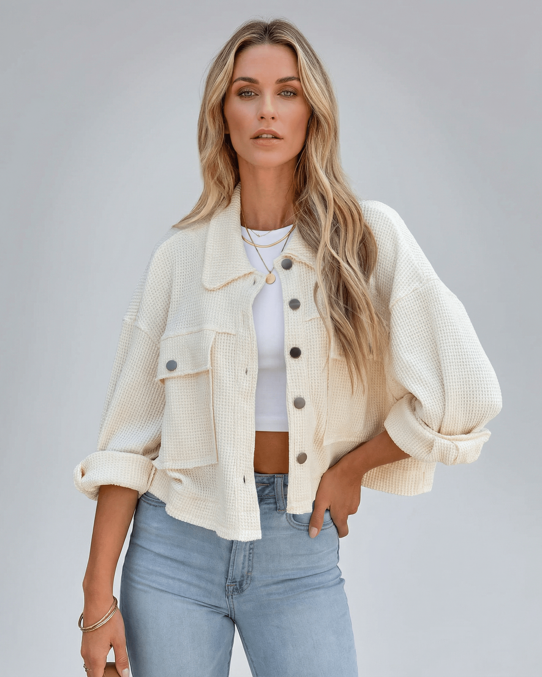 Zima Jacket by RAMBLION in a cozy beige, oversized fit, perfect for layering over outfits for a stylish look.